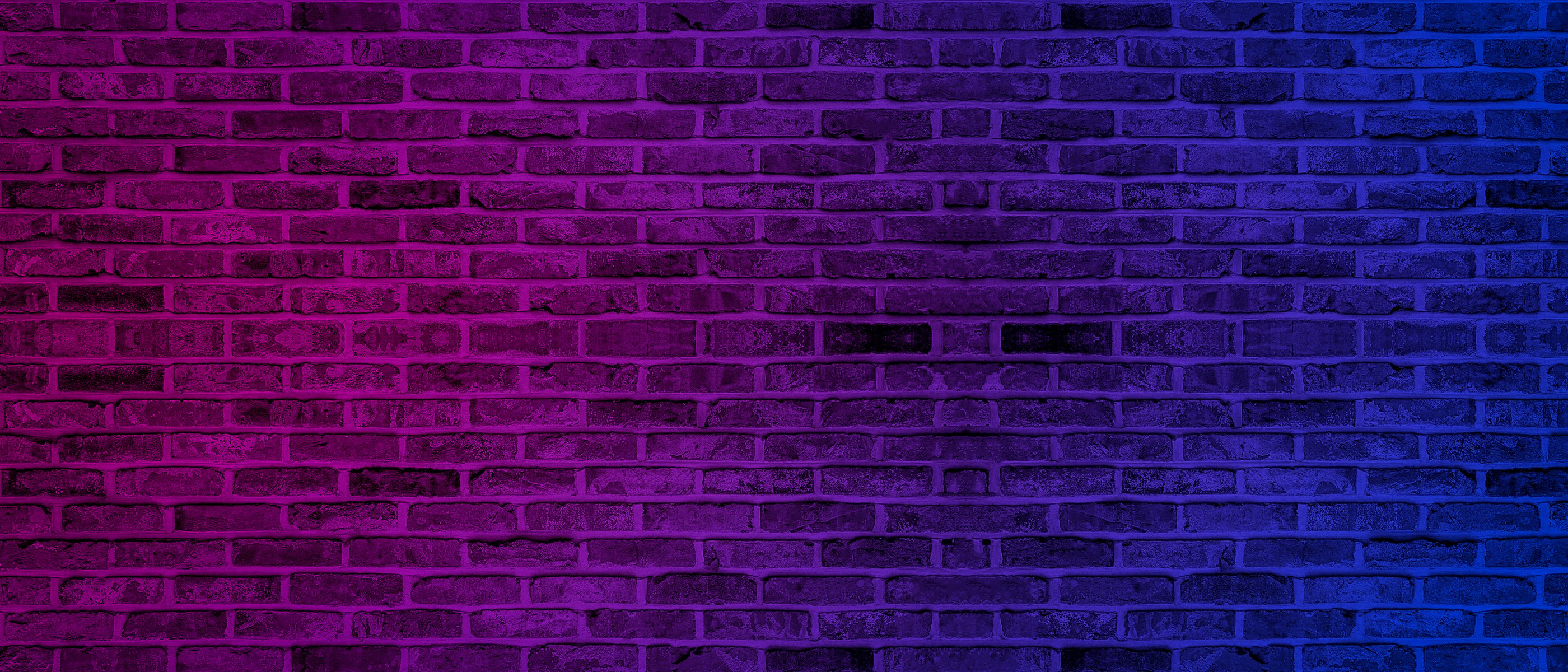 Lighting effect neon light on brick wall texture